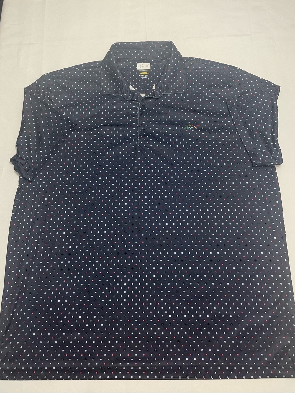 Greg Norman Collection Navy Polo with White and Red Dots‎